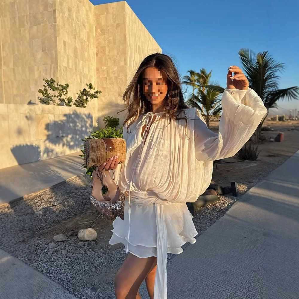 Damer elegant topp med voluminösa ärmar och matchande shorts Mirla-Eva Jonsson