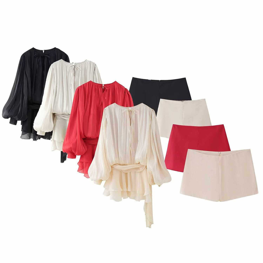 Damer elegant topp med voluminösa ärmar och matchande shorts Mirla-Eva Jonsson
