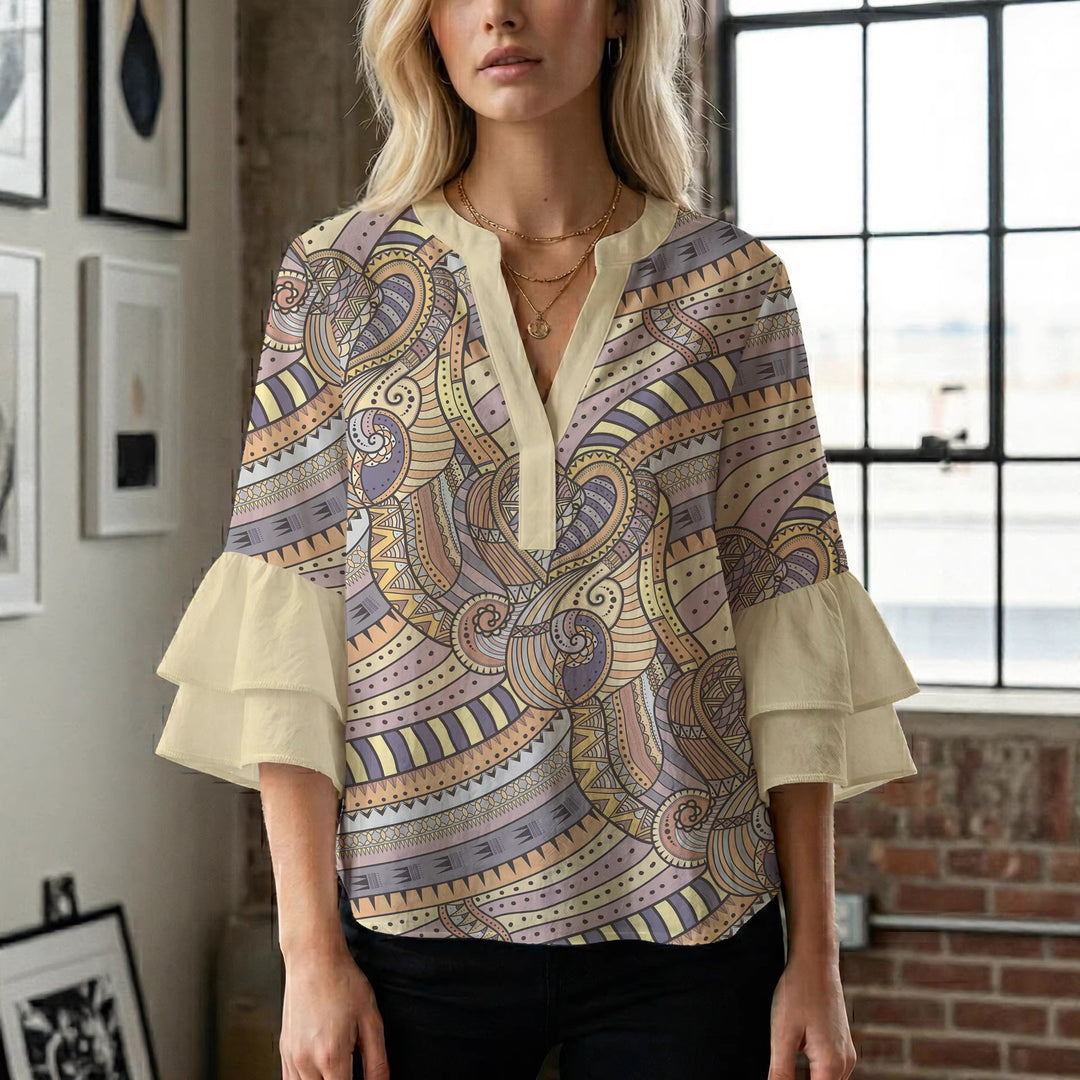 Damer elegant topp med voluminösa rynkade kanter och blommönster Mirla-Eva Jonsson