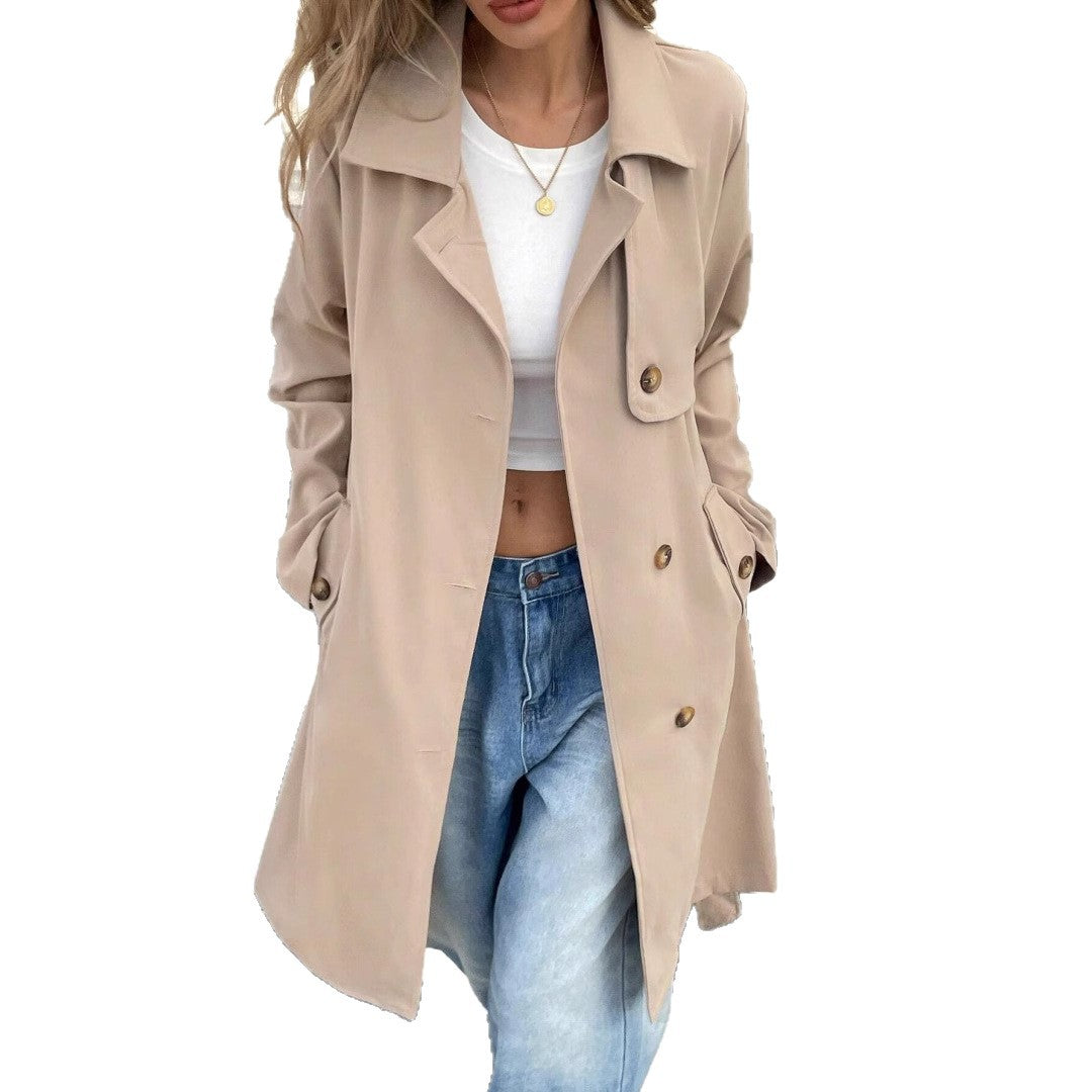 Damer elegant trenchcoat i minimalistisk stil med bälte och praktiska fickor Mirla-Eva Jonsson