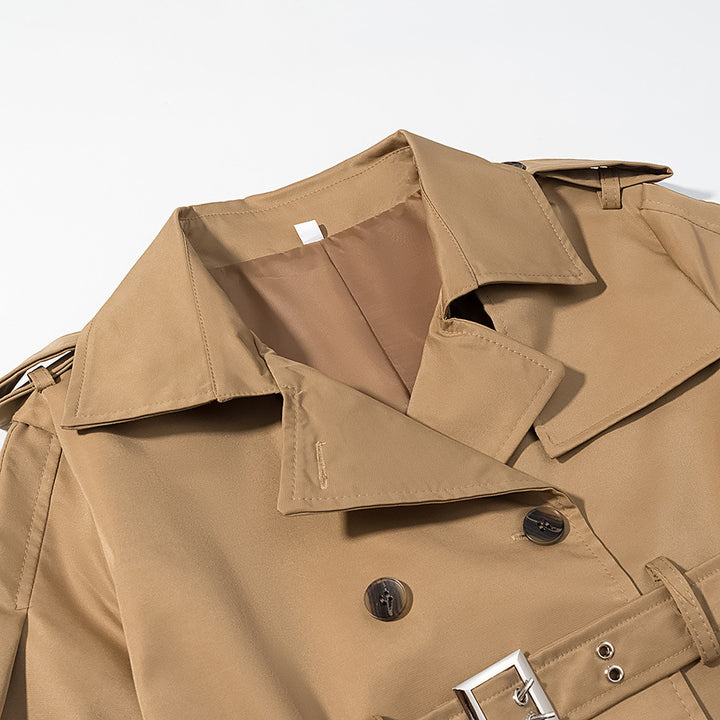 Damer elegant trenchcoat med figursydd bälte och epauletterade axlar Mirla-Eva Jonsson