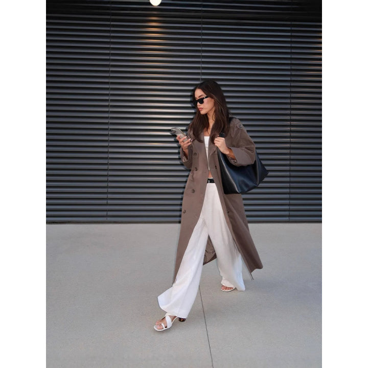 Damer elegant trenchcoat med moderna detaljer och smal silhuett Eva Jonsson-Eva Jonsson