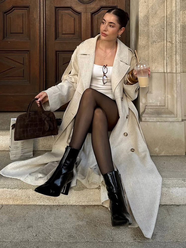 Damer elegant trenchcoat med utsökt knappdetaljer Mirla-Eva Jonsson