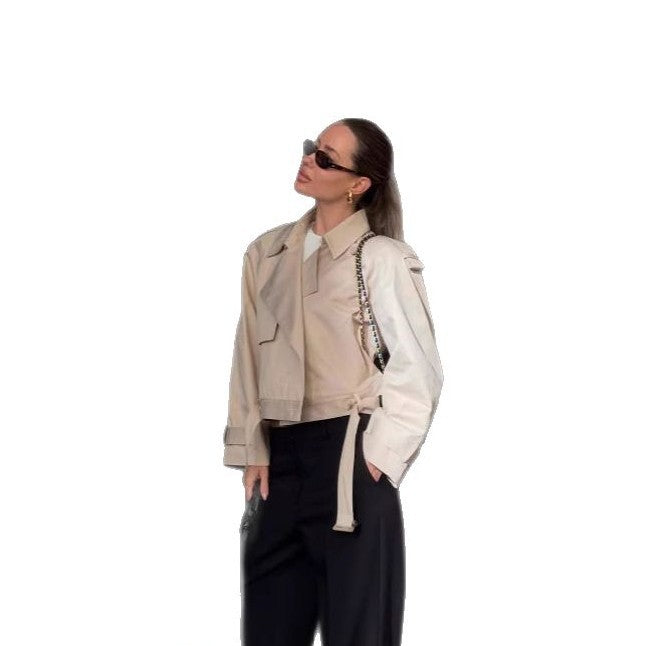 Damer elegant trenchjacka med innovativ klipp och praktiska detaljer Eva Jonsson-Eva Jonsson