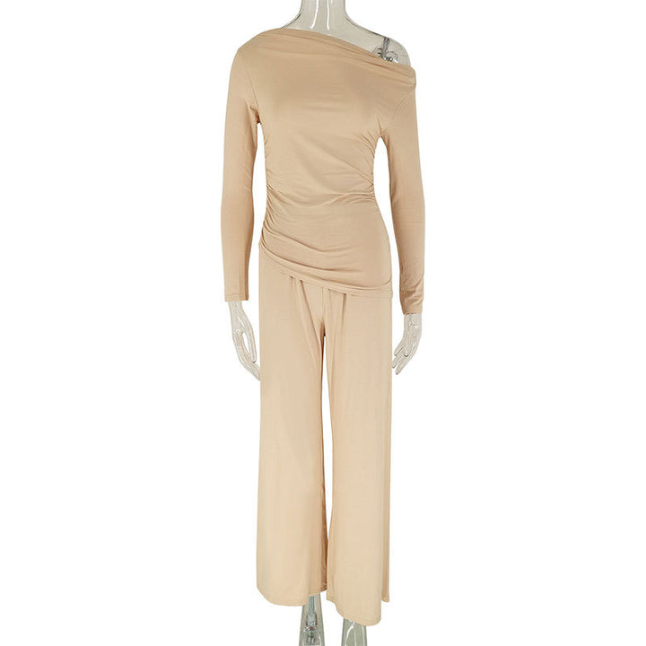 Damer elegant tvådelat set i flytande material med asymmetrisk design Mirla-Eva Jonsson
