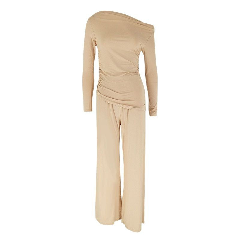 Damer elegant tvådelat set i flytande material med asymmetrisk design Mirla-Eva Jonsson