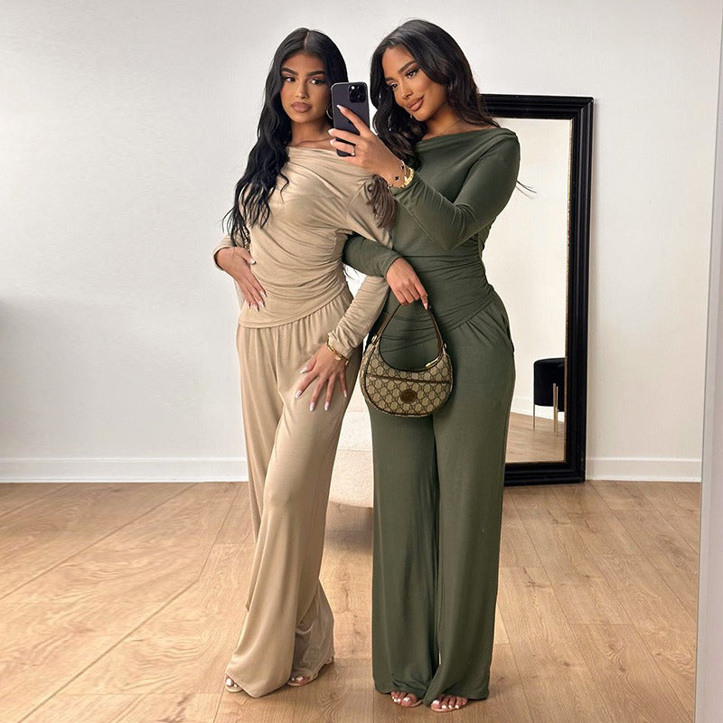 Damer elegant tvådelat set i flytande material med asymmetrisk design Mirla-Eva Jonsson