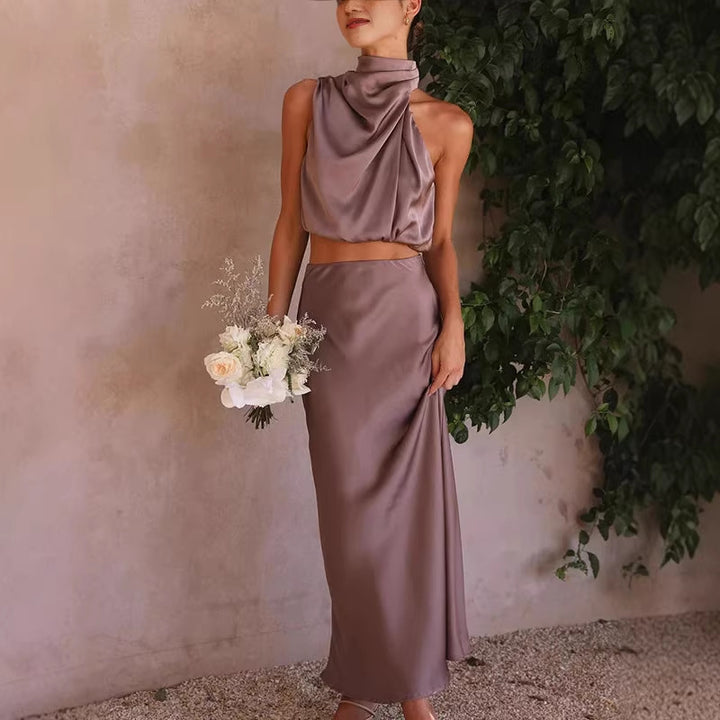 Damer elegant tvådelat set med ärmlös topp och svängande kjol Mirla-Eva Jonsson