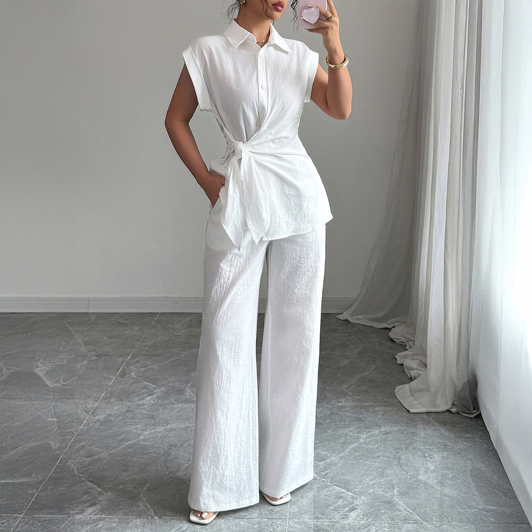 Damer elegant tvådelat set med formsydd blus och vida byxor Mirla-Eva Jonsson