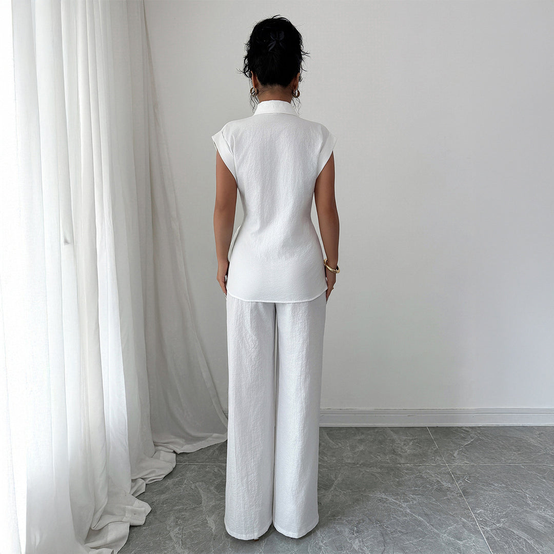 Damer elegant tvådelat set med formsydd blus och vida byxor Mirla-Eva Jonsson