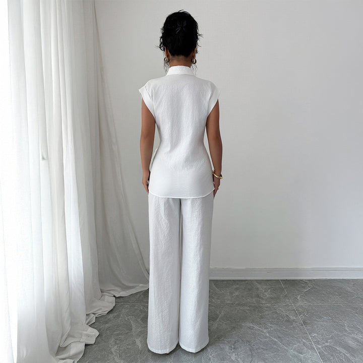 Damer elegant tvådelat set med formsydd blus och vida byxor Mirla-Eva Jonsson