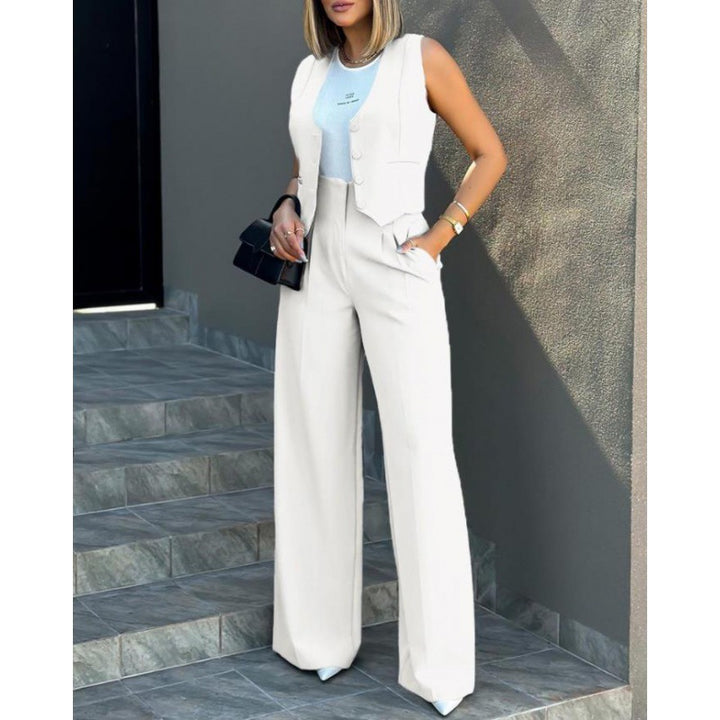 Damer elegant tvådelat set med löst skuren blazer och hög midja byxa Mirla-Eva Jonsson