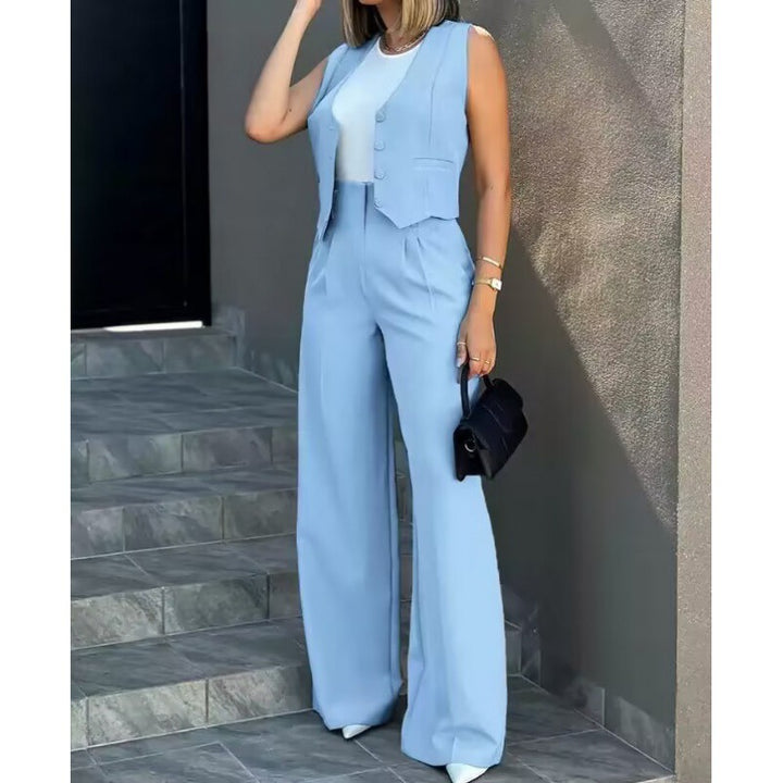 Damer elegant tvådelat set med löst skuren blazer och hög midja byxa Mirla-Eva Jonsson