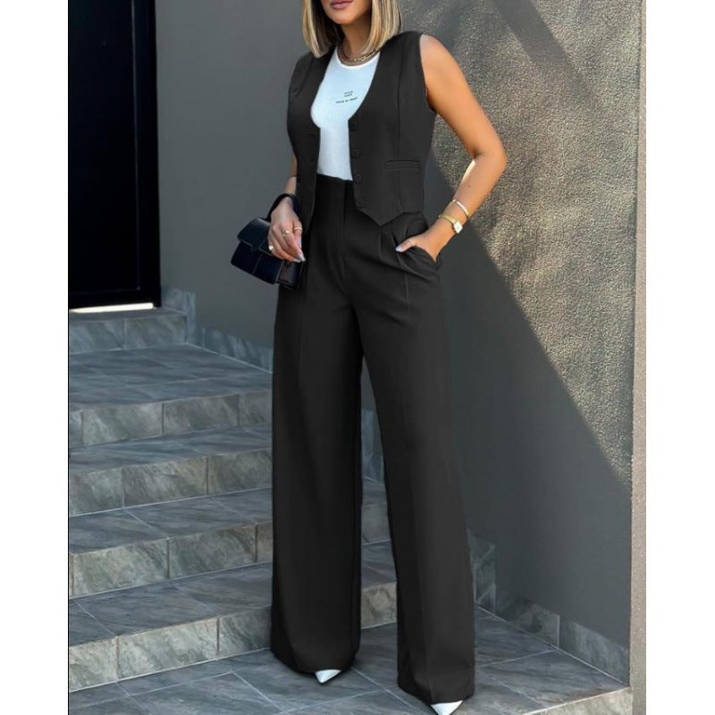 Damer elegant tvådelat set med löst skuren blazer och hög midja byxa Mirla-Eva Jonsson