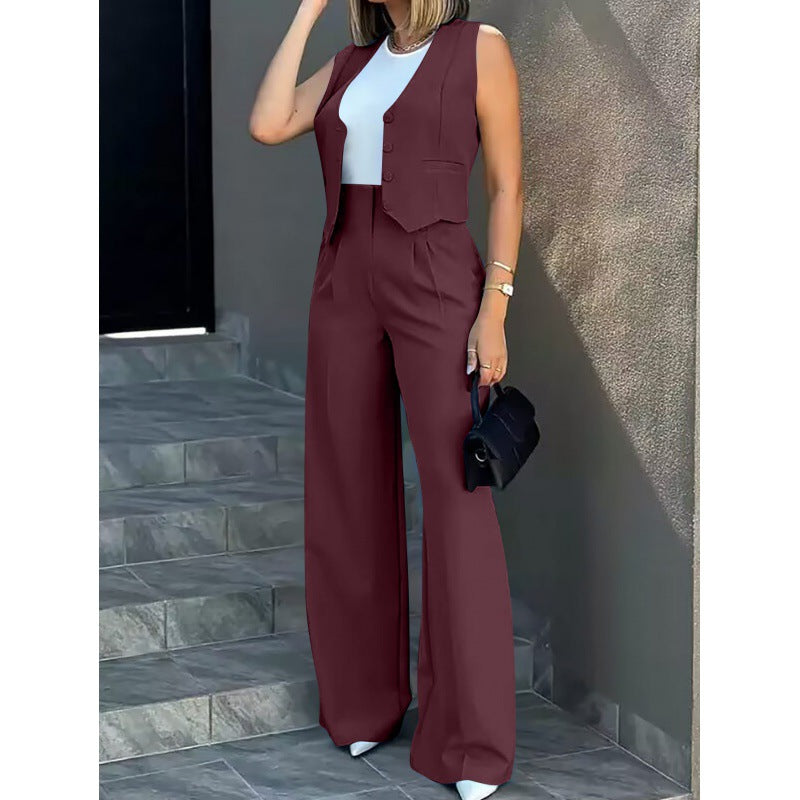 Damer elegant tvådelat set med löst skuren blazer och hög midja byxa Mirla-Eva Jonsson