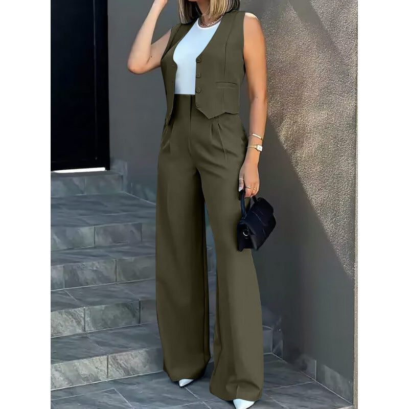 Damer elegant tvådelat set med löst skuren blazer och hög midja byxa Mirla-Eva Jonsson