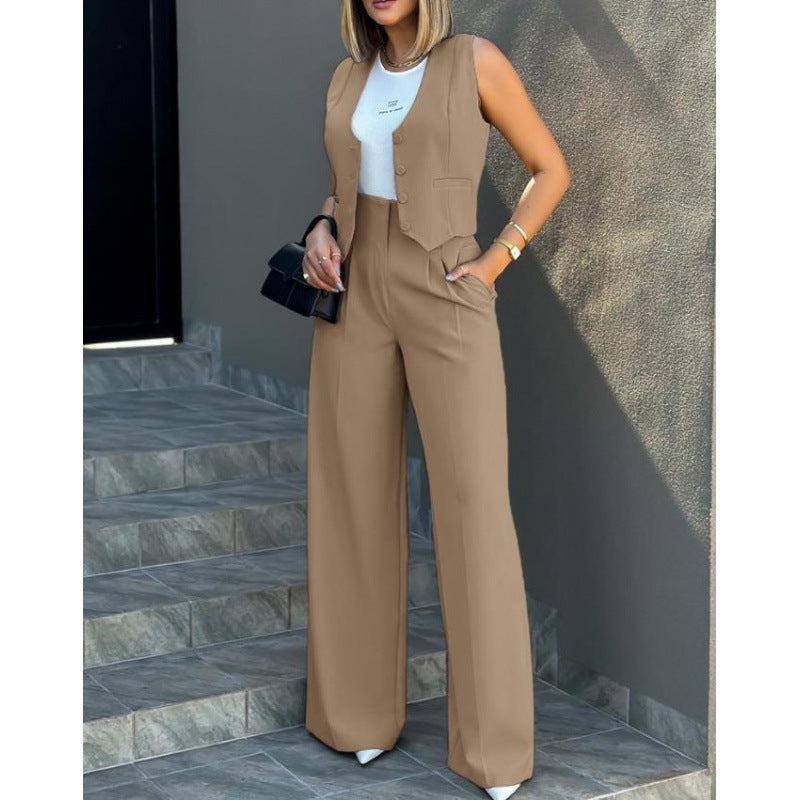 Damer elegant tvådelat set med löst skuren blazer och hög midja byxa Mirla-Eva Jonsson