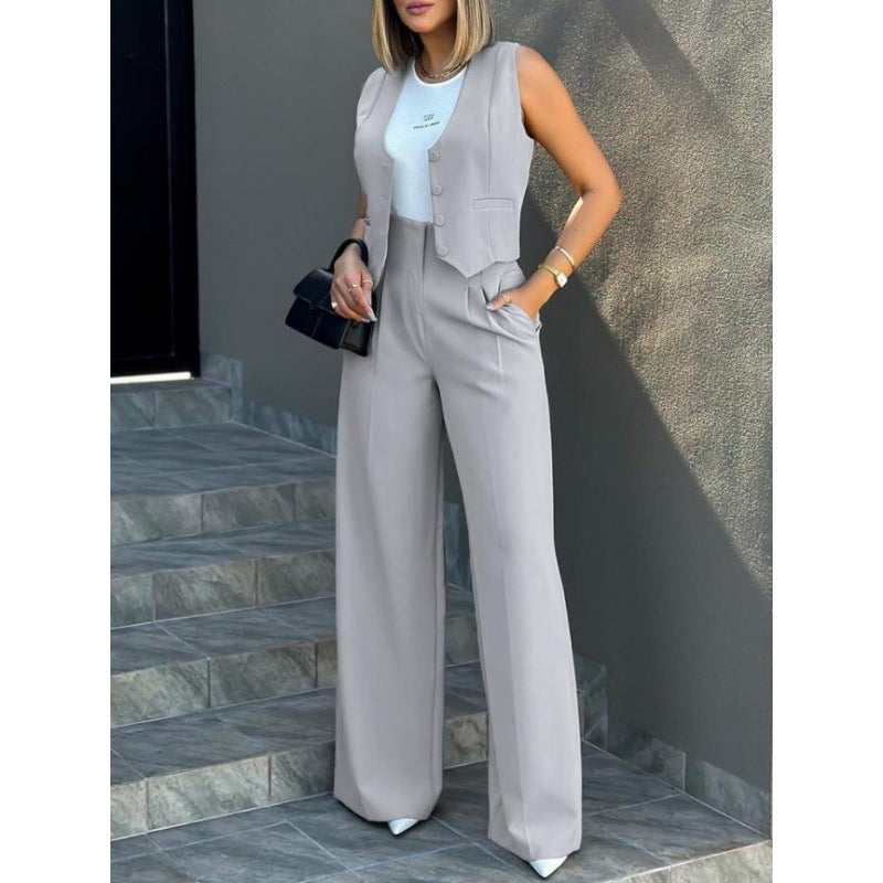 Damer elegant tvådelat set med löst skuren blazer och hög midja byxa Mirla-Eva Jonsson