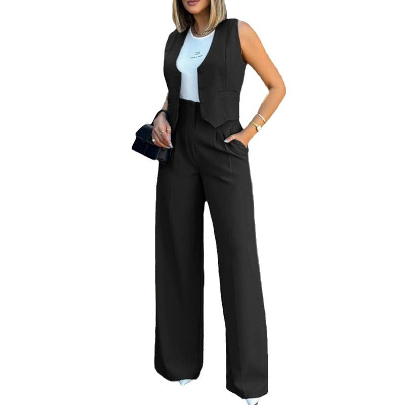Damer elegant tvådelat set med löst skuren blazer och hög midja byxa Mirla-Eva Jonsson