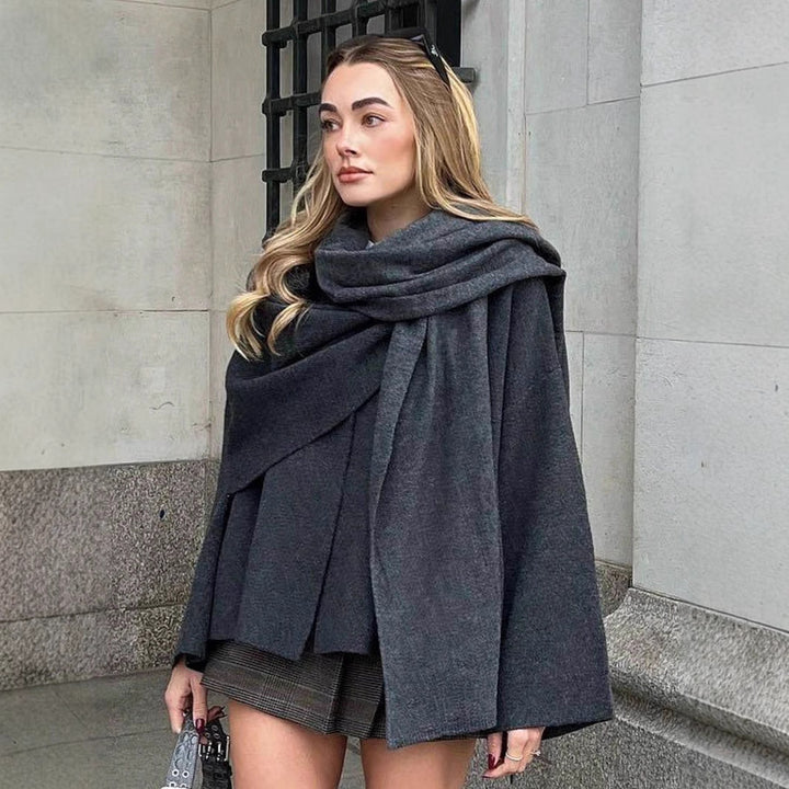 Damer elegant ullhängjacka med asymmetrisk fåll Mirla-Eva Jonsson