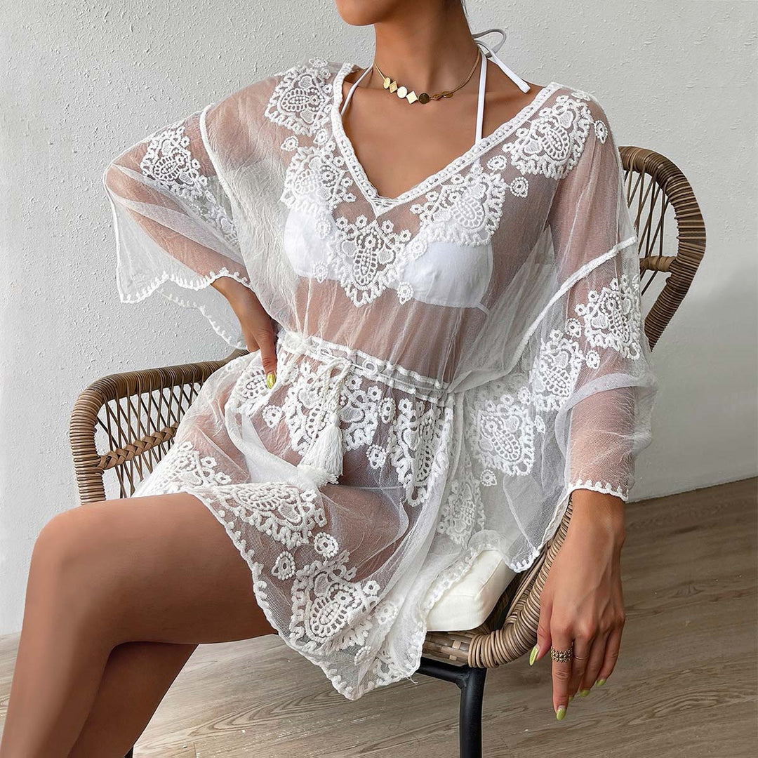 Damer elegant virkad strandtunika med figursydd bälte och volangärmar Mirla-Eva Jonsson