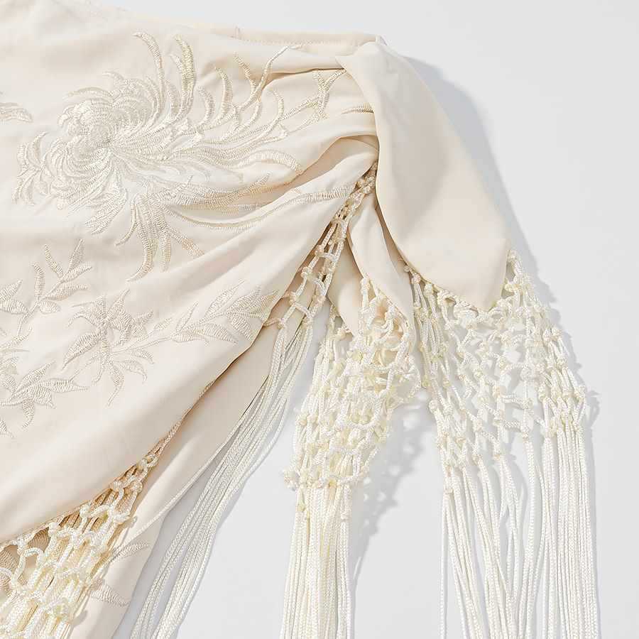 Damer elegant wrapkjol med fransar och broderier Eva Jonsson-Eva Jonsson