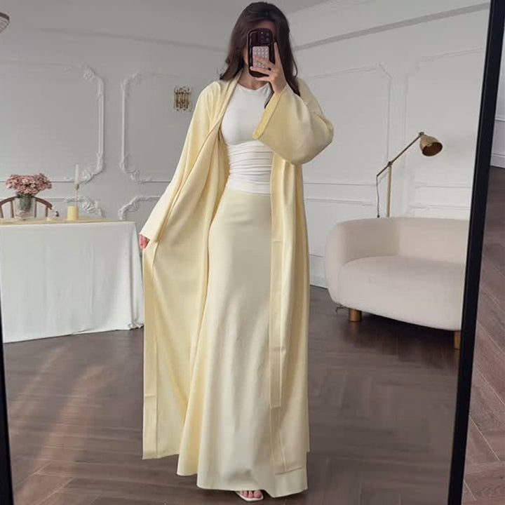 Damer eleganta långrock med mjukt flödande silhuett Mirla-Eva Jonsson