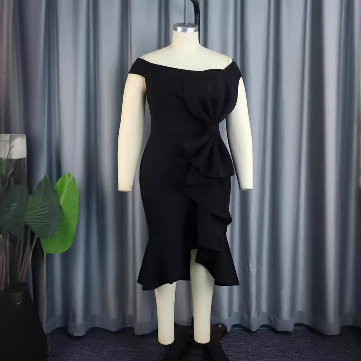 Damer eleganta off-shoulder klänning med volangdetaljer Mirla-Eva Jonsson