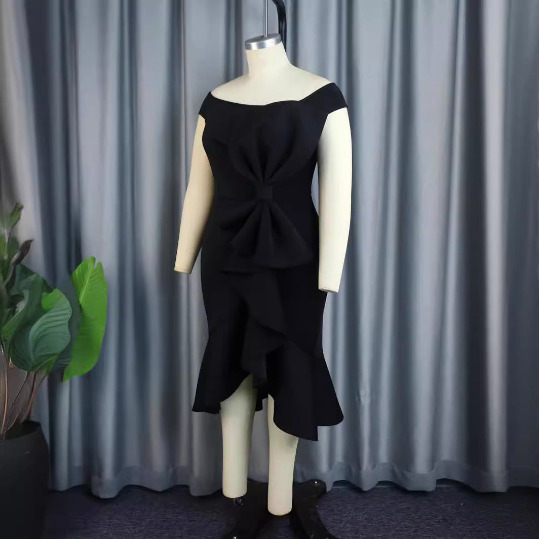 Damer eleganta off-shoulder klänning med volangdetaljer Mirla-Eva Jonsson