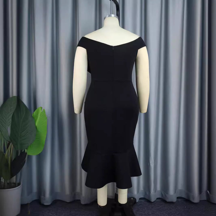 Damer eleganta off-shoulder klänning med volangdetaljer Mirla-Eva Jonsson