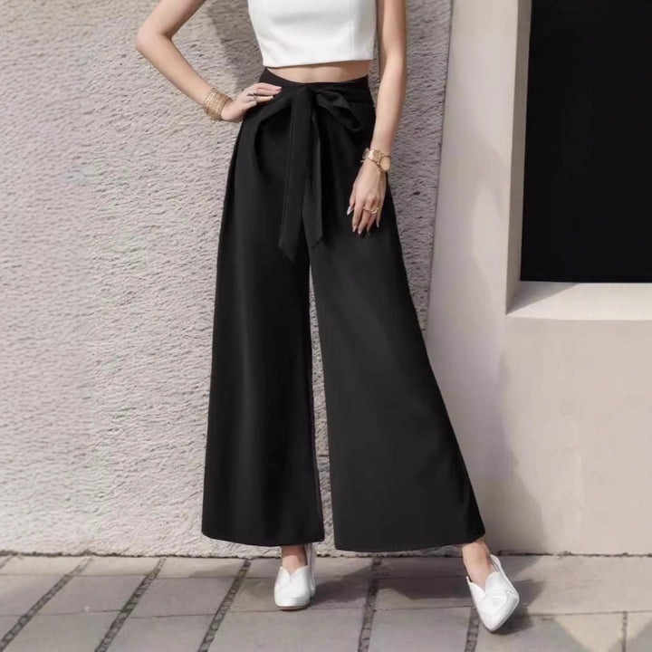 Damer eleganta vida byxor med avkortad midja Mirla-Eva Jonsson