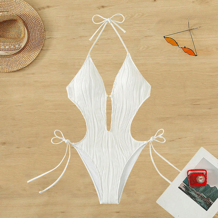 Damer en del baddräkt med modernt cut-out och elastisk draperingsdetalj Mirla-Eva Jonsson