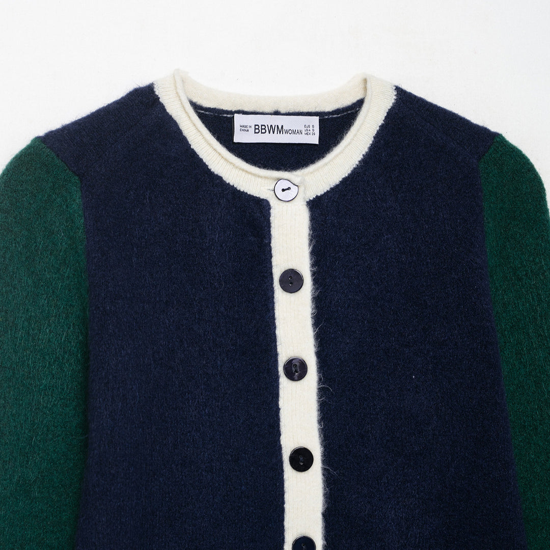 Damer fashionabel cardigan med dekorativa knappdetaljer Mirla-Eva Jonsson