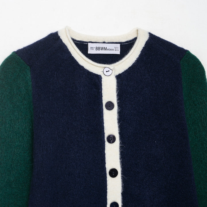 Damer fashionabel cardigan med dekorativa knappdetaljer Mirla-Eva Jonsson