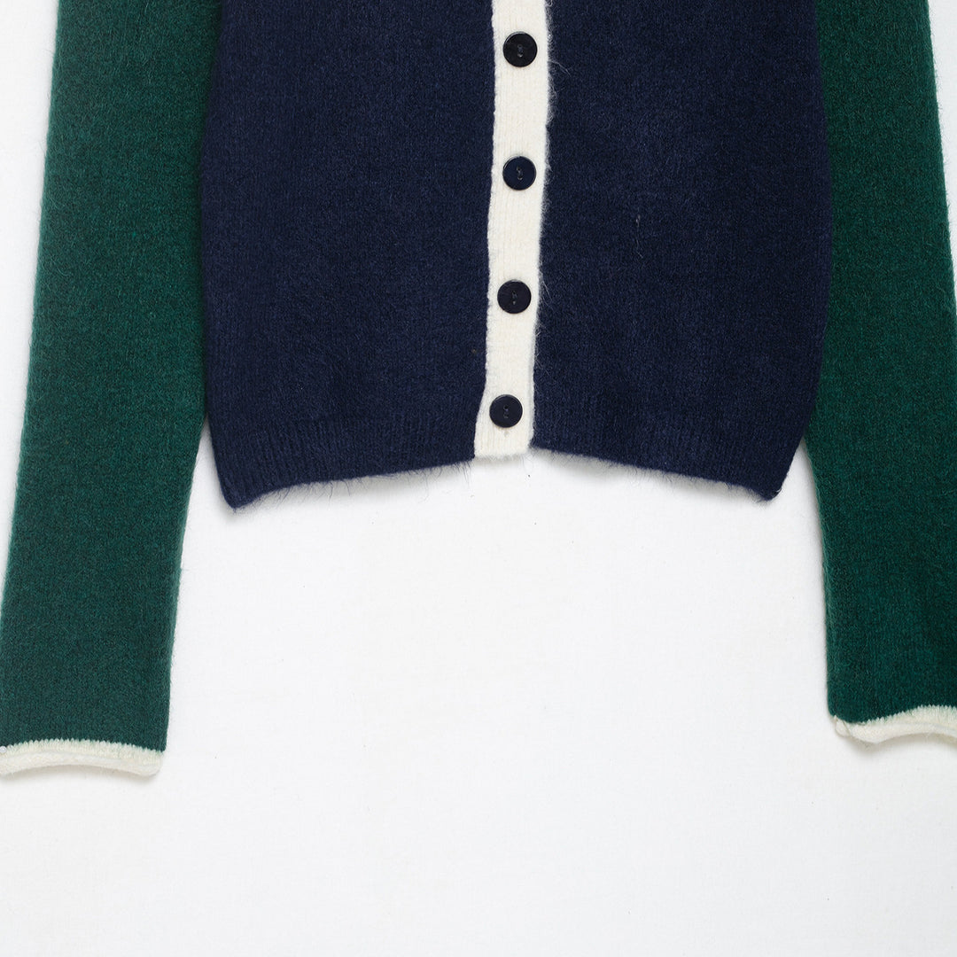 Damer fashionabel cardigan med dekorativa knappdetaljer Mirla-Eva Jonsson