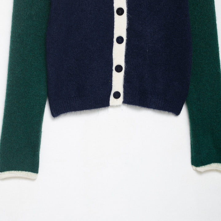 Damer fashionabel cardigan med dekorativa knappdetaljer Mirla-Eva Jonsson