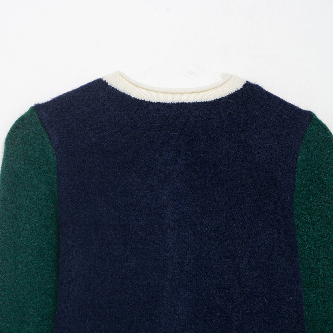 Damer fashionabel cardigan med dekorativa knappdetaljer Mirla-Eva Jonsson