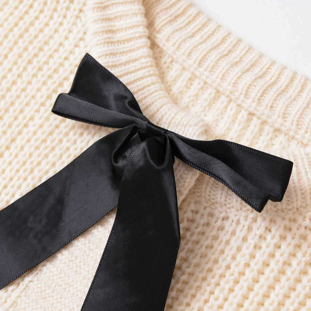 Damer fashionabel stickad tröja med detaljer i slinga Mirla-Eva Jonsson