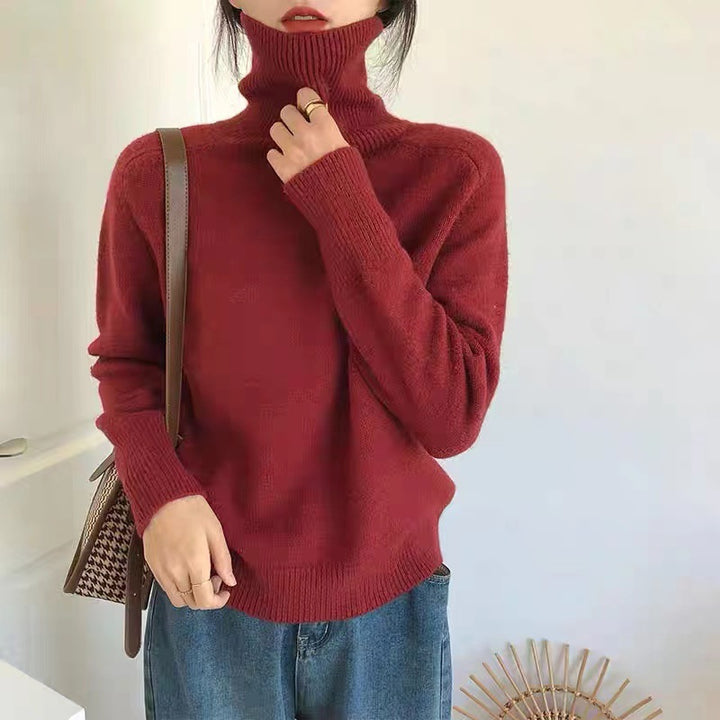 Damer fashionabelt polokrage tröja gjord av mjuk stickad Mirla-Eva Jonsson