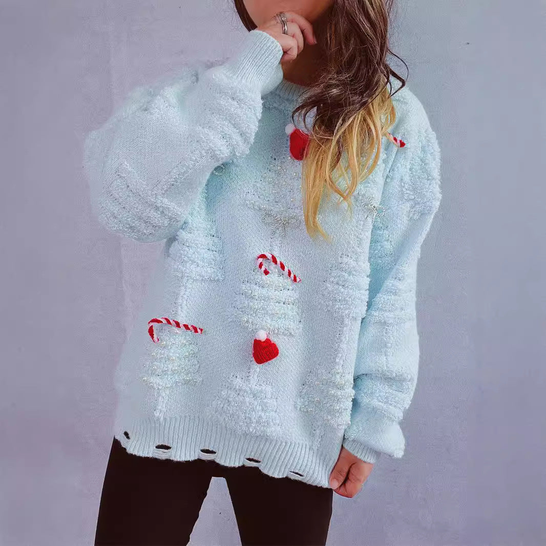 Damer festlig tröja med kreativa julmotiv och strukturerad design Mirla-Eva Jonsson