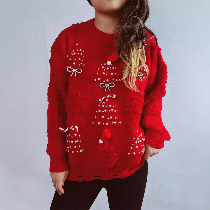 Damer festlig tröja med kreativa julmotiv och strukturerad design Mirla-Eva Jonsson