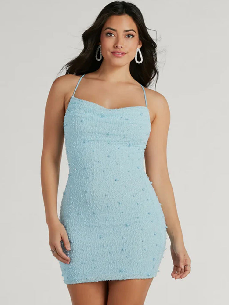 Damer figurformande miniklänning med strukturerad yta och spagettiremmar Mirla-Eva Jonsson
