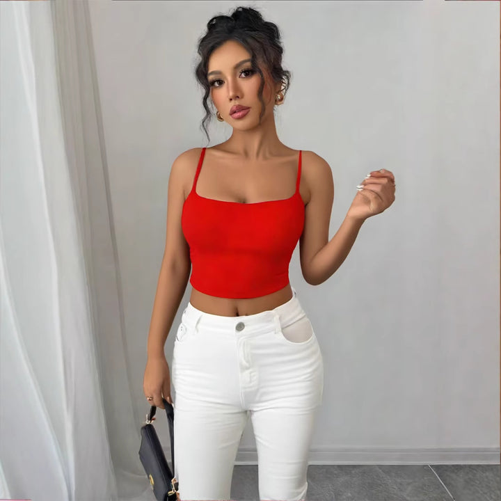 Damer figurnära crop-top i elastiskt material med spaghettiband Mirla-Eva Jonsson
