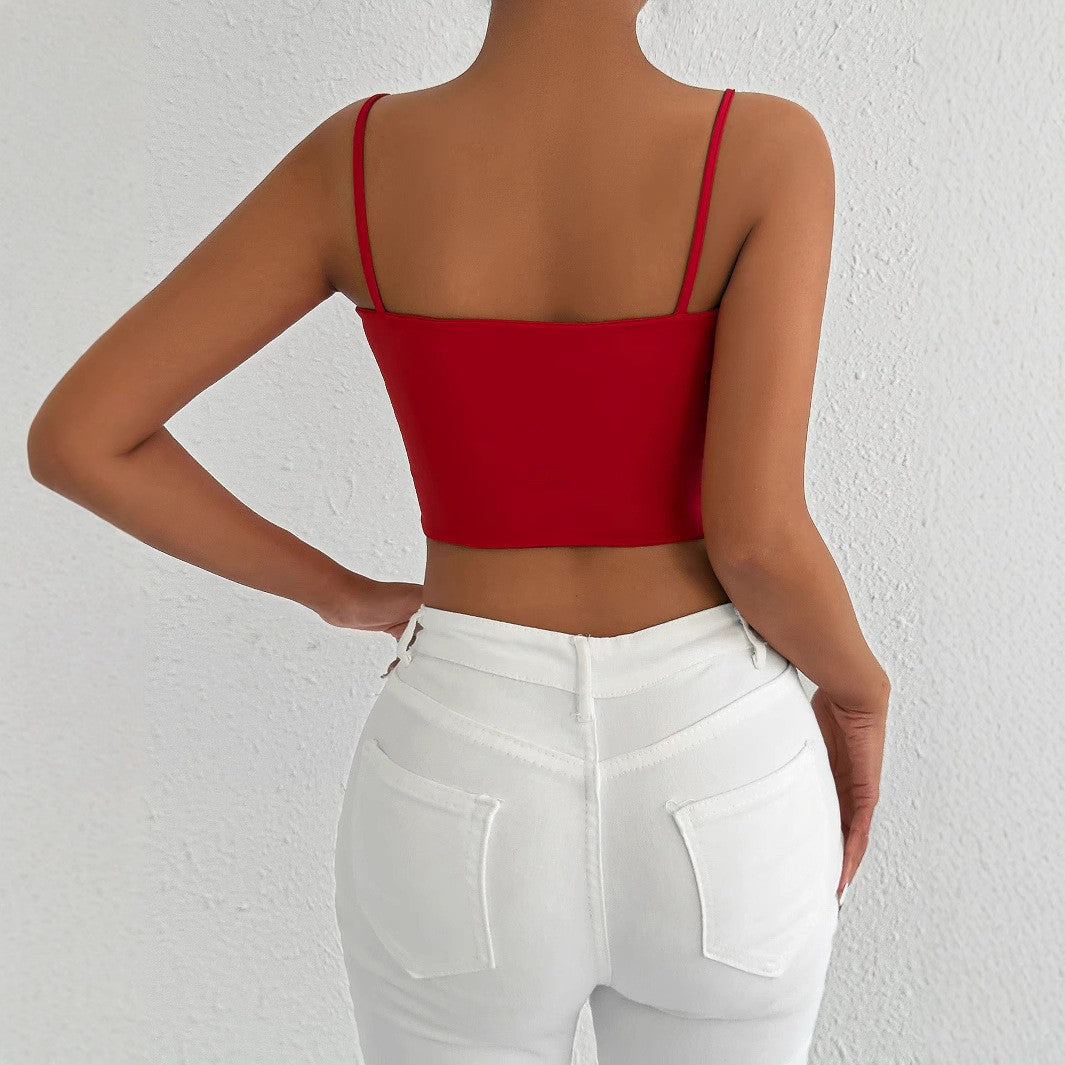 Damer figurnära crop-top i elastiskt material med spaghettiband Mirla-Eva Jonsson