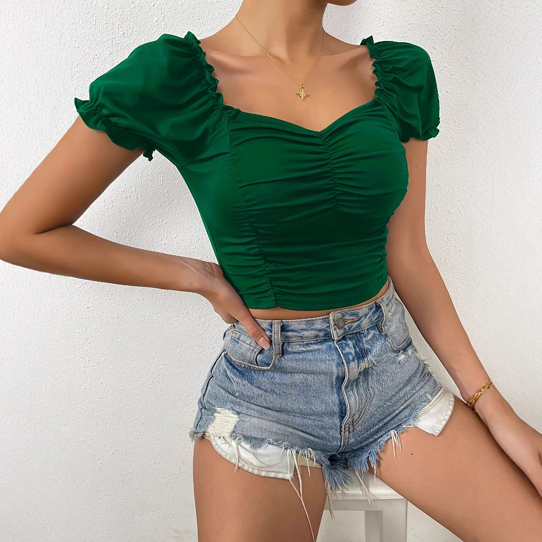 Damer figurnära crop-top med puffsleeves och rynkning Mirla-Eva Jonsson