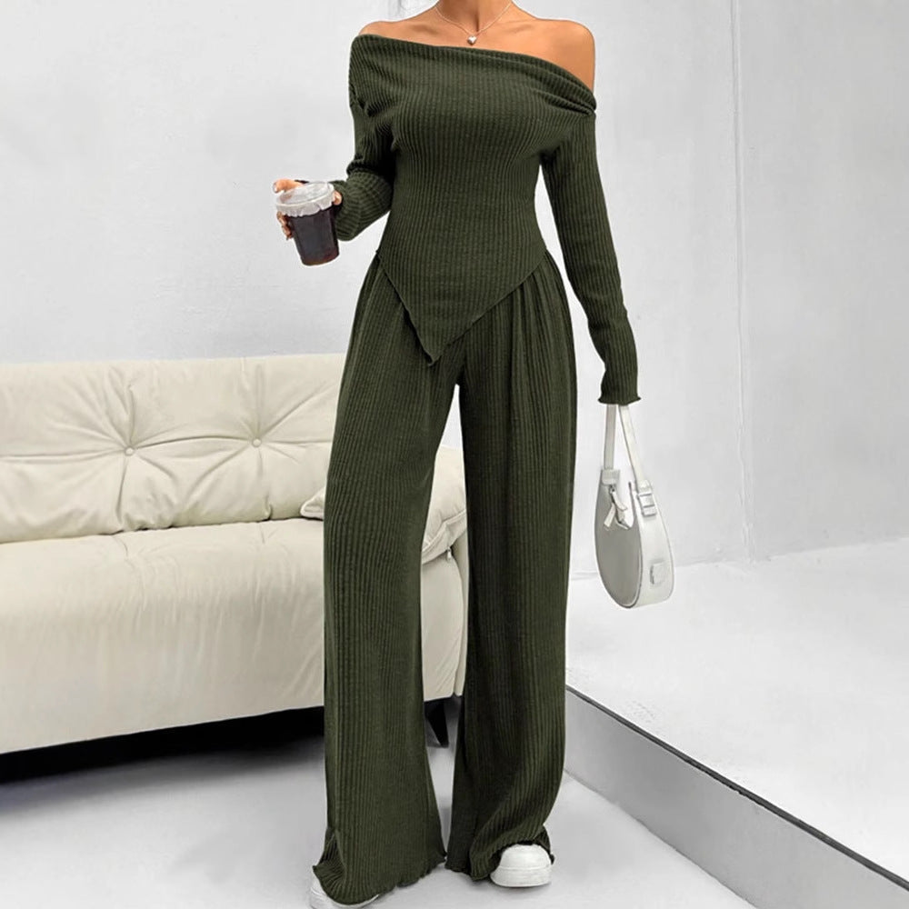 Damer figurnära jumpsuit med asymmetrisk halsringning och långa ärmar Mirla-Eva Jonsson