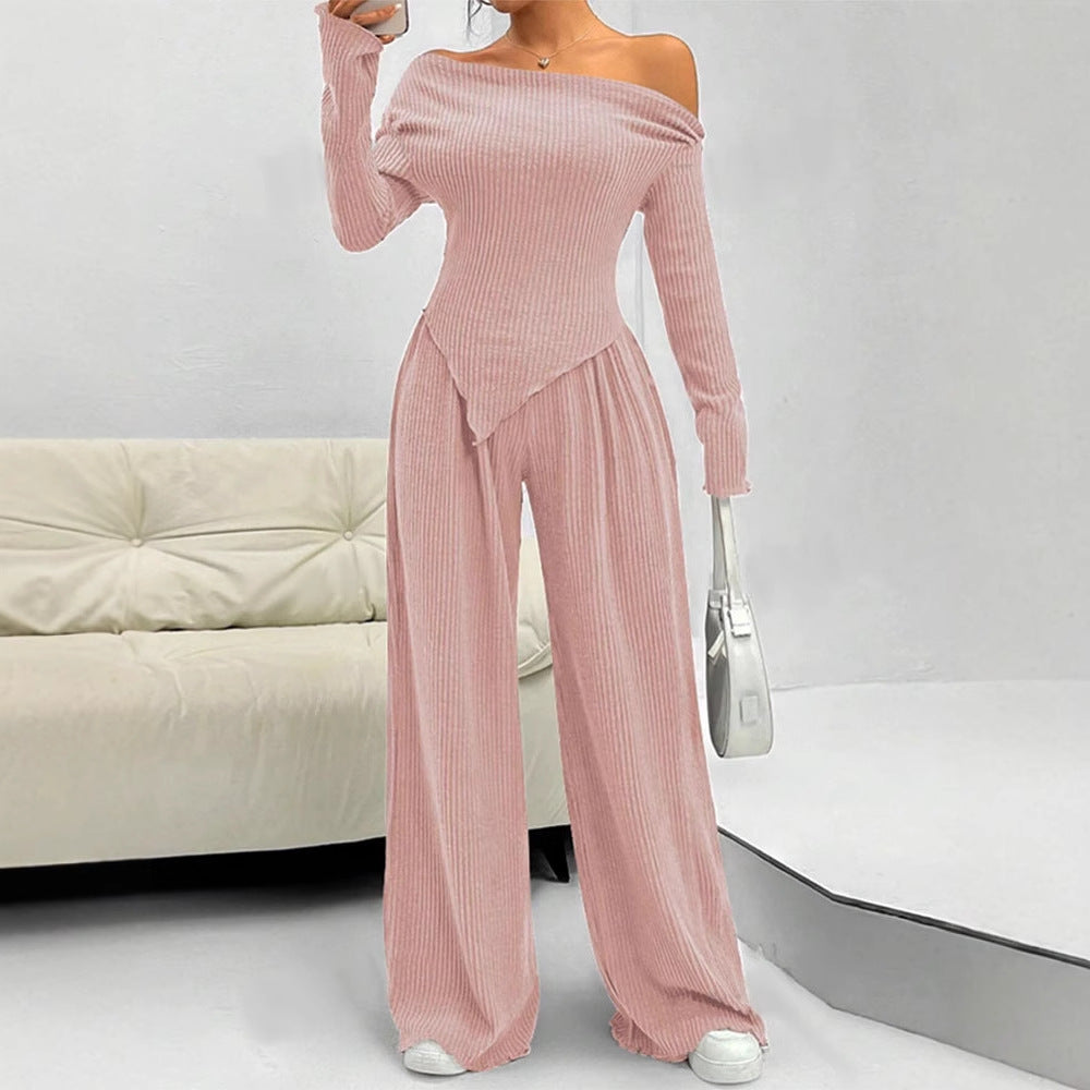 Damer figurnära jumpsuit med asymmetrisk halsringning och långa ärmar Mirla-Eva Jonsson