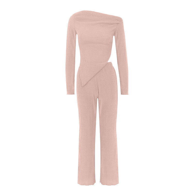 Damer figurnära jumpsuit med asymmetrisk halsringning och långa ärmar Mirla-Eva Jonsson