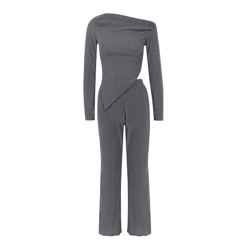 Damer figurnära jumpsuit med asymmetrisk halsringning och långa ärmar Mirla-Eva Jonsson