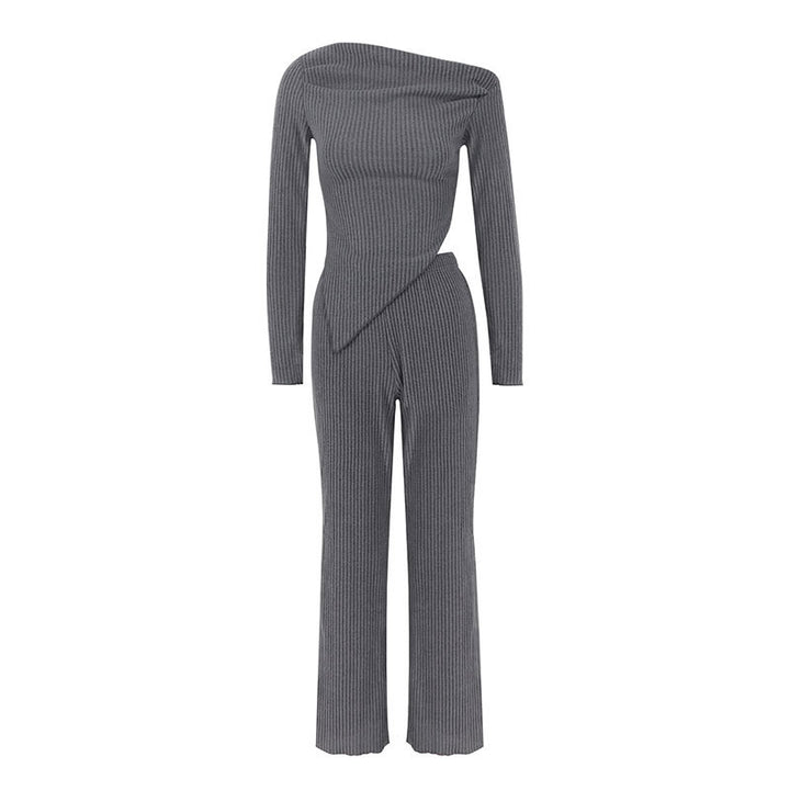 Damer figurnära jumpsuit med asymmetrisk halsringning och långa ärmar Mirla-Eva Jonsson
